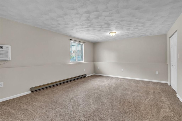 50 Juniper Rd Unit 1C, North Attleboro, MA 02760 - unfurnished room with a baseboard radiator, carpet floors, a textured ceiling, and baseboards