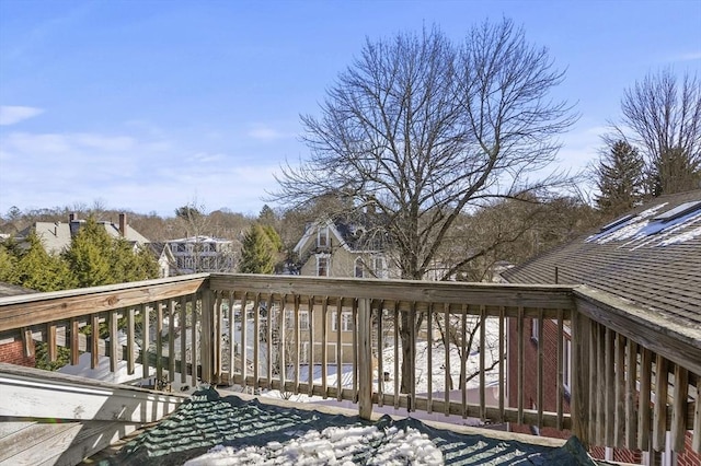 view of snow covered deck