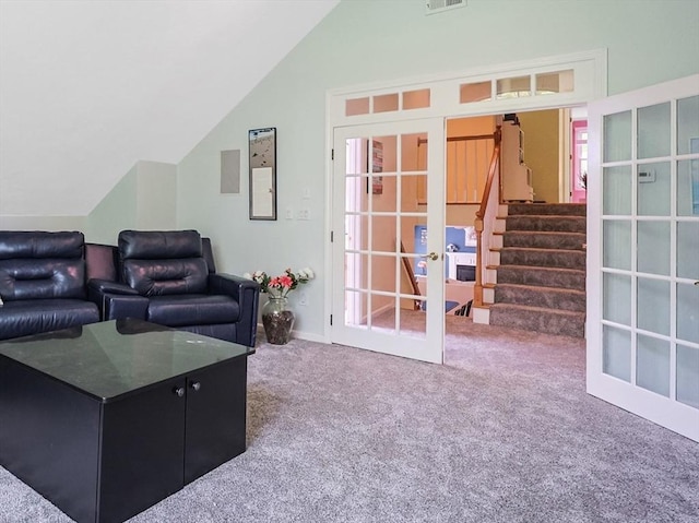 8 Rock Rd, Attleboro, MA 02703 - carpeted living room featuring french doors, vaulted ceiling, and stairs