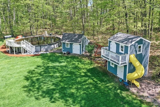 8 Rock Rd, Attleboro, MA 02703 - view of green lawn with a deck, stairway, and a wooded view
