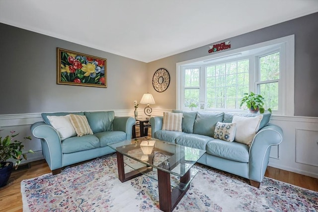 8 Rock Rd, Attleboro, MA 02703 - living room with wainscoting, wood finished floors, and a decorative wall