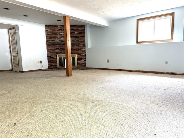 117 Metropolitan Ave Unit 117, Ashland, MA 01721 - unfurnished living room with carpet and a fireplace