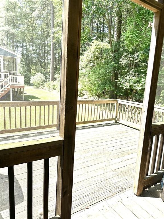 117 Metropolitan Ave Unit 117, Ashland, MA 01721 - deck featuring view of wooded area