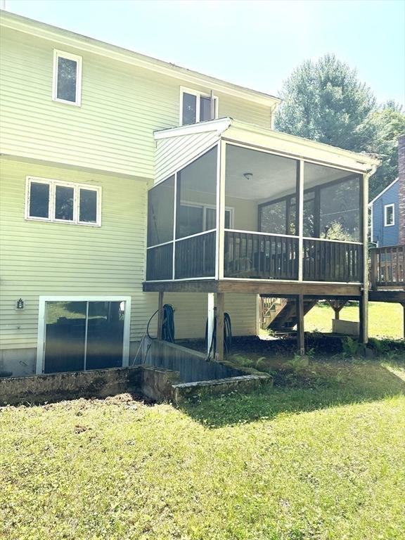 117 Metropolitan Ave Unit 117, Ashland, MA 01721 - back of house with a sunroom and a lawn