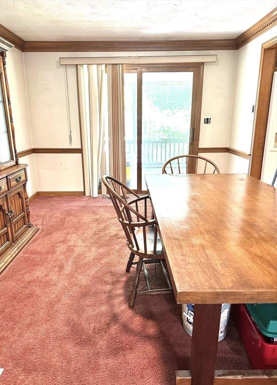 117 Metropolitan Ave Unit 117, Ashland, MA 01721 - dining area featuring carpet and crown molding
