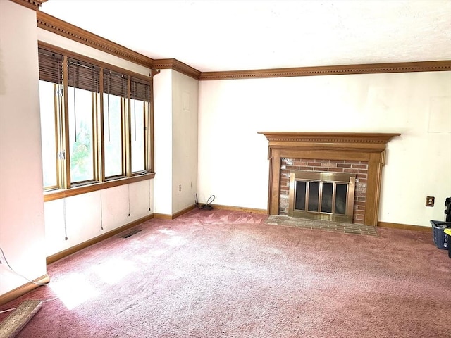 117 Metropolitan Ave Unit 117, Ashland, MA 01721 - unfurnished living room featuring carpet, a brick fireplace, and crown molding