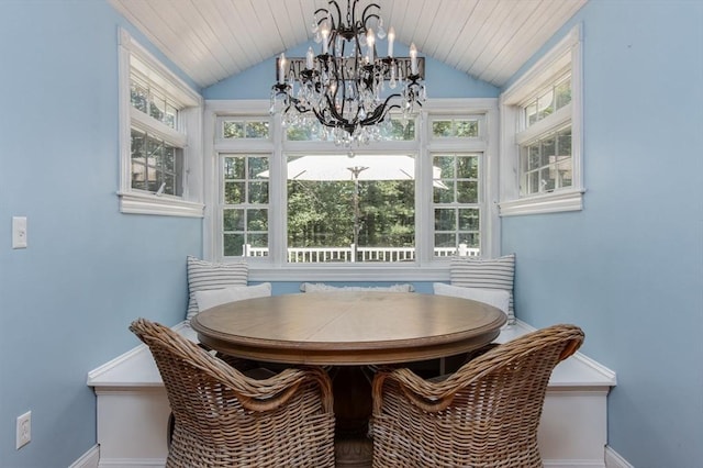 8 Whitaker Ln, Groton, MA 01450 - dining space featuring a chandelier, baseboards, and lofted ceiling