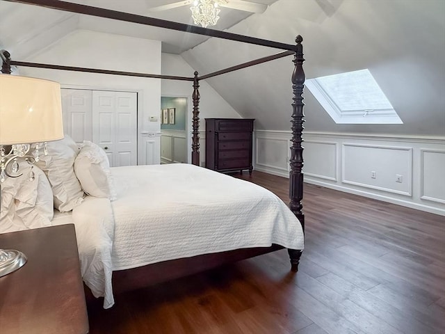 8 Whitaker Ln, Groton, MA 01450 - bedroom featuring a skylight, wood finished floors, wainscoting, and a closet
