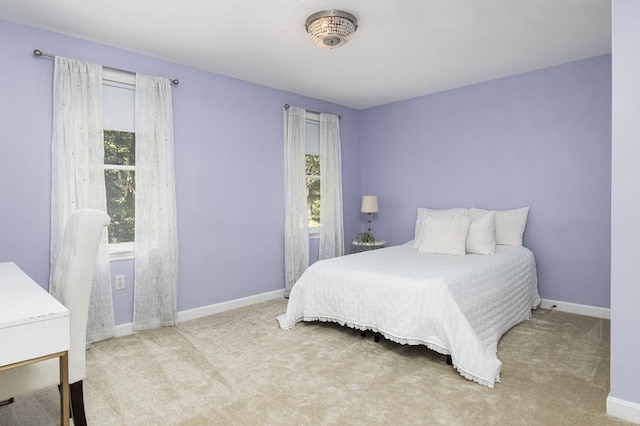 8 Whitaker Ln, Groton, MA 01450 - carpeted bedroom featuring multiple windows and baseboards
