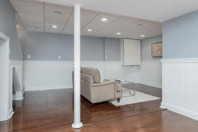 8 Whitaker Ln, Groton, MA 01450 - living area featuring wainscoting, wood finished floors, a drop ceiling, and baseboards