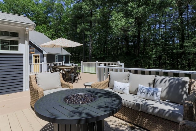 8 Whitaker Ln, Groton, MA 01450 - wooden terrace with outdoor dining space and an outdoor living space with a fire pit