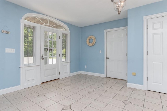 8 Whitaker Ln, Groton, MA 01450 - entrance foyer with baseboards and light tile patterned floors