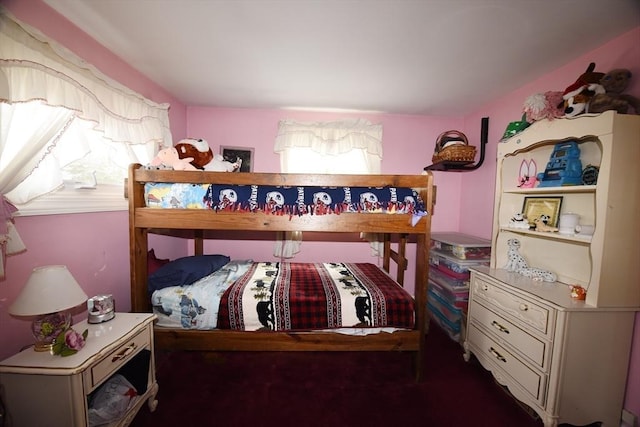 bedroom with multiple windows