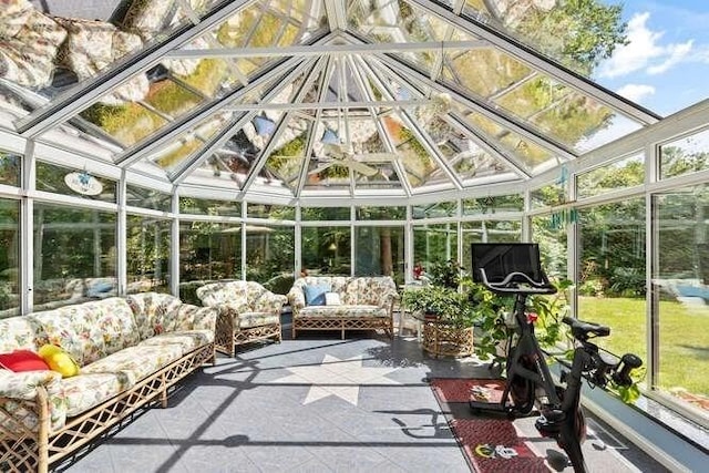 sunroom / solarium featuring an outdoor hangout area