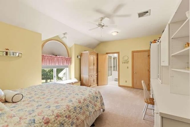 bedroom featuring carpet, visible vents, a ceiling fan, and lofted ceiling
