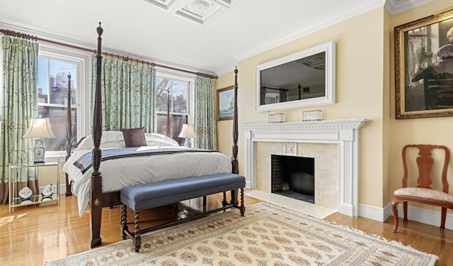 357-359 Beacon St Unit 4, Boston, MA 02116 - bedroom with a fireplace, crown molding, baseboards, and wood finished floors