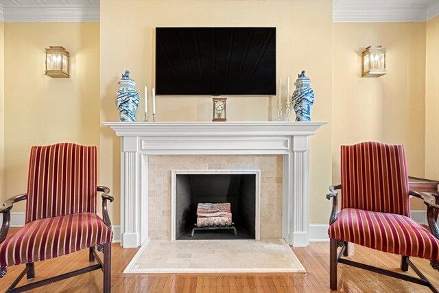 357-359 Beacon St Unit 4, Boston, MA 02116 - sitting room featuring hardwood / wood-style flooring, ornamental molding, baseboards, and a fireplace with raised hearth