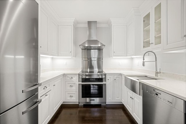 357-359 Beacon St Unit 4, Boston, MA 02116 - kitchen with a sink, wall chimney exhaust hood, light countertops, white cabinets, and appliances with stainless steel finishes