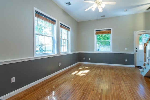 31-33 Ashland St Unit 5, Haverhill, MA 01830 - spare room featuring plenty of natural light, stairway, and hardwood / wood-style flooring