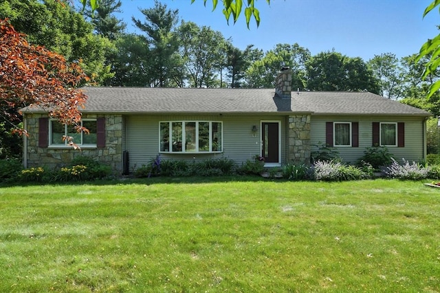 9 E Colonial Rd, Wilbraham, MA 01095 - ranch-style home featuring stone siding, a chimney, and a front lawn