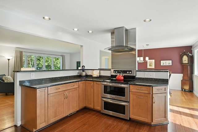 9 E Colonial Rd, Wilbraham, MA 01095 - kitchen featuring double oven range, wall chimney range hood, a peninsula, dark wood-type flooring, and recessed lighting