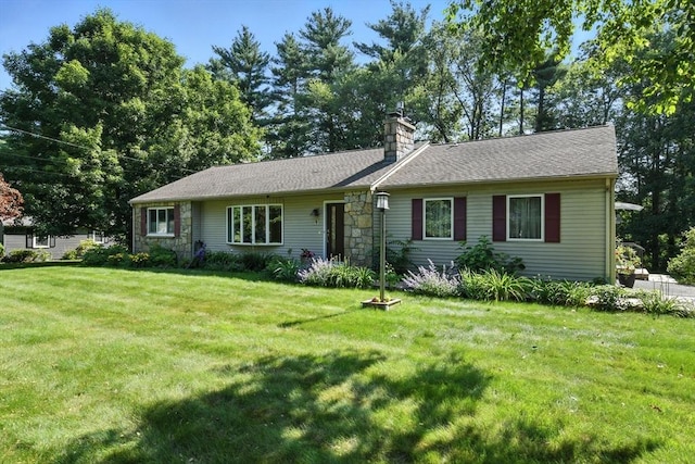 9 E Colonial Rd, Wilbraham, MA 01095 - single story home with a chimney and a front yard