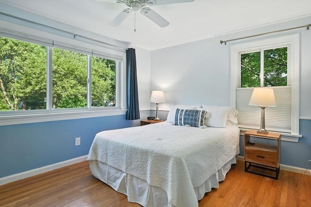 9 E Colonial Rd, Wilbraham, MA 01095 - bedroom featuring multiple windows, wood finished floors, and ceiling fan