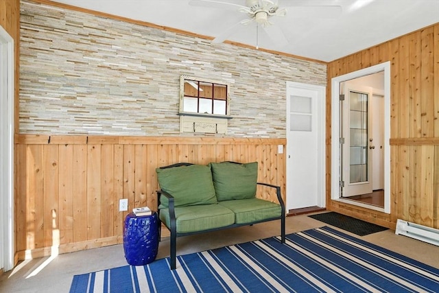 9 E Colonial Rd, Wilbraham, MA 01095 - sitting room with wood walls, a ceiling fan, crown molding, and a baseboard heating unit