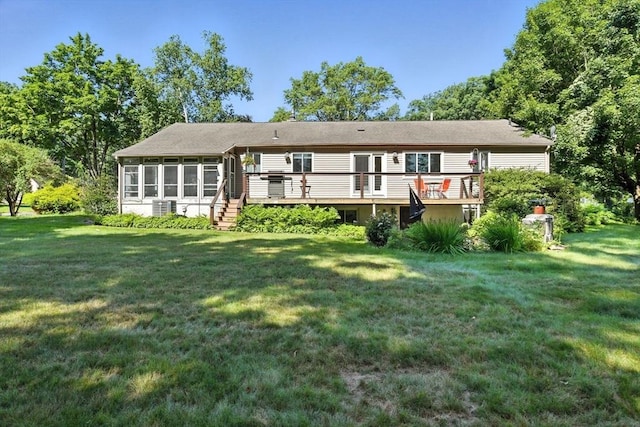 9 E Colonial Rd, Wilbraham, MA 01095 - back of house with a sunroom, a deck, and a yard