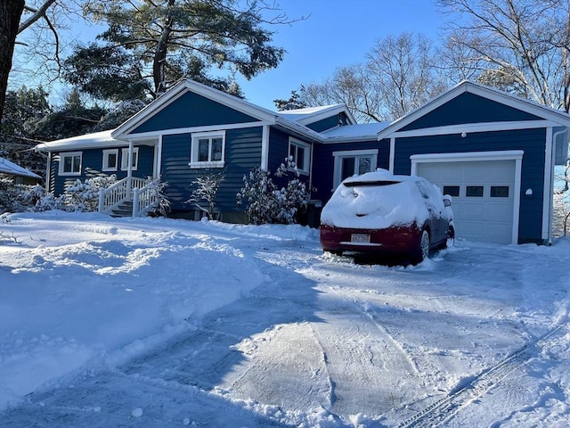 view of front of property with a garage