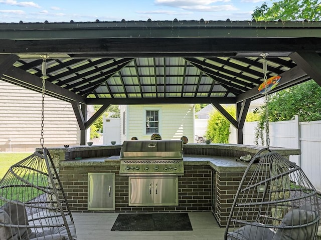 77 Columbus Dr, Fall River, MA 02720 - view of patio featuring a gazebo, exterior kitchen, and an outdoor bar