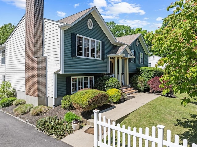 77 Columbus Dr, Fall River, MA 02720 - view of front of home featuring a chimney