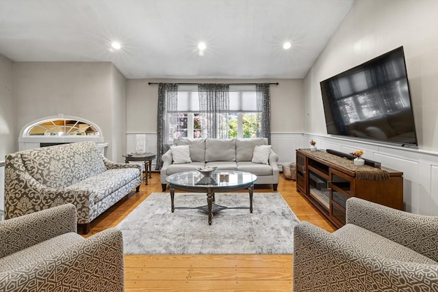 77 Columbus Dr, Fall River, MA 02720 - living room featuring wainscoting, recessed lighting, and lofted ceiling