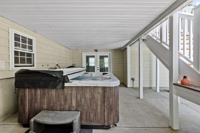 77 Columbus Dr, Fall River, MA 02720 - view of patio / terrace featuring french doors, stairway, and a hot tub