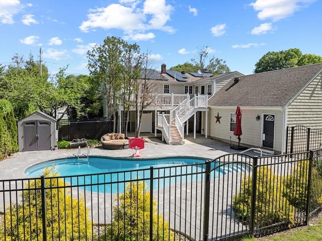77 Columbus Dr, Fall River, MA 02720 - view of swimming pool with a fenced backyard, a wooden deck, stairway, and a patio area