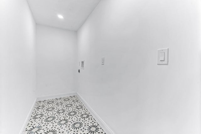 interior space featuring baseboards and tile patterned floors