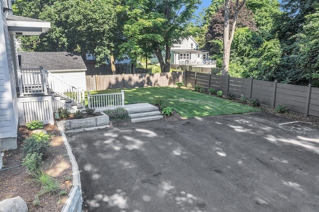 view of patio / terrace featuring stairway and a fenced backyard