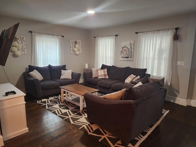 6 Pond St, Avon, MA 02322 - living area with baseboards and wood finished floors