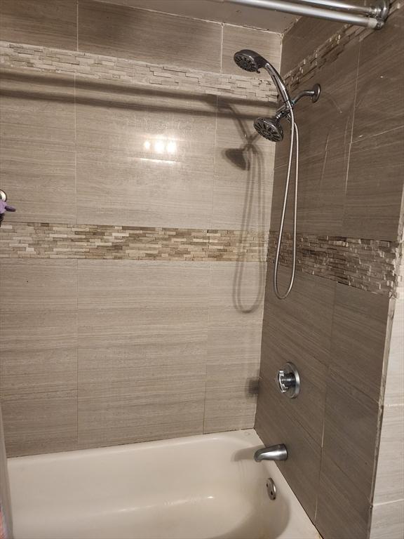 6 Pond St, Avon, MA 02322 - bathroom featuring tub / shower combination