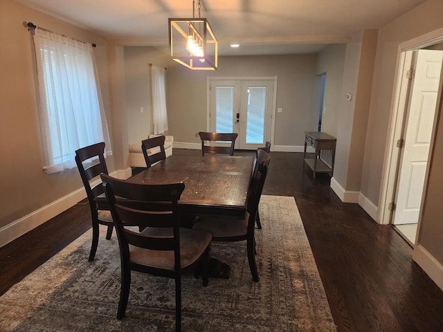 6 Pond St, Avon, MA 02322 - dining area featuring a chandelier, dark wood-style flooring, baseboards, and french doors