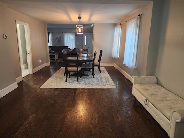 6 Pond St, Avon, MA 02322 - dining space featuring dark wood-type flooring, baseboards, and plenty of natural light