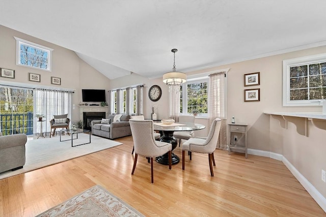 dining space featuring a chandelier and light hardwood / wood-style floors