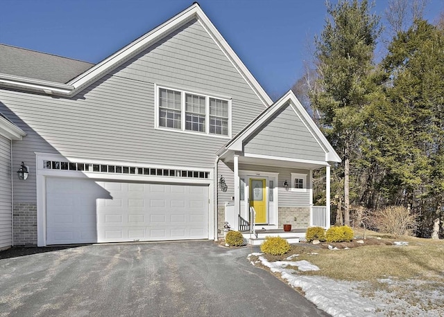 view of front of property with a garage