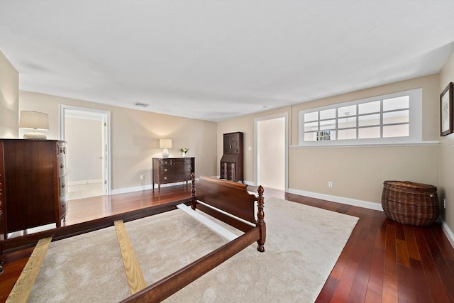 bedroom featuring dark hardwood / wood-style floors