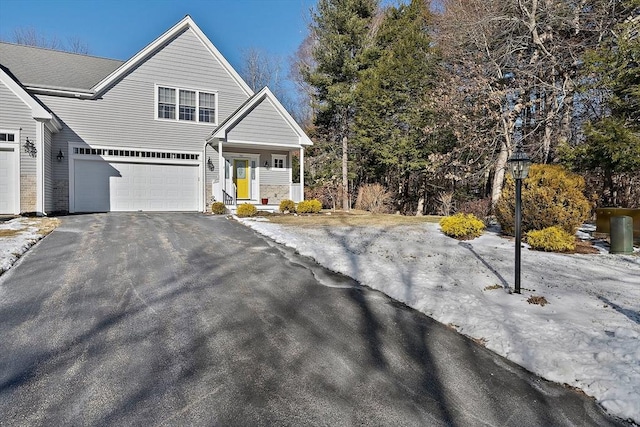 front of property with a garage