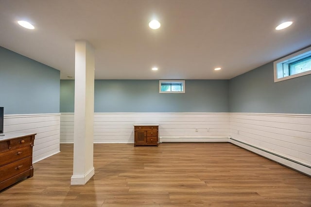 495 Creek St, Wrentham, MA 02093 - below grade area featuring wainscoting, wood walls, wood finished floors, recessed lighting, and a baseboard heating unit
