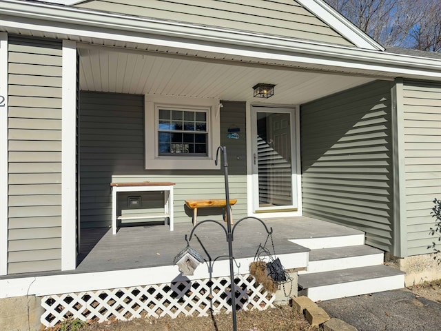 property entrance with covered porch