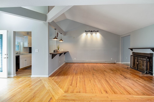 unfurnished living room with a baseboard heating unit, light wood-type flooring, sink, and vaulted ceiling