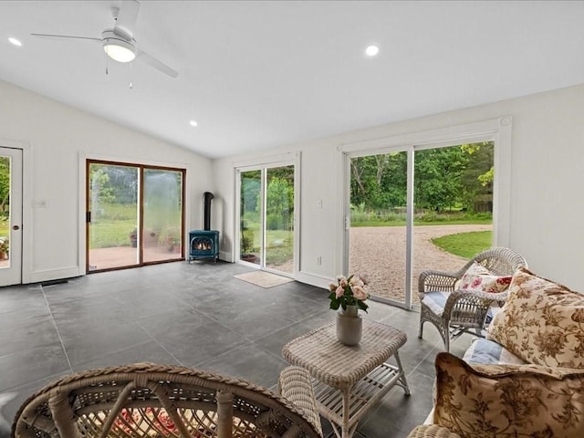 131 Cedar St, Middleboro, MA 02346 - living area with a wood stove, vaulted ceiling, a ceiling fan, recessed lighting, and baseboards