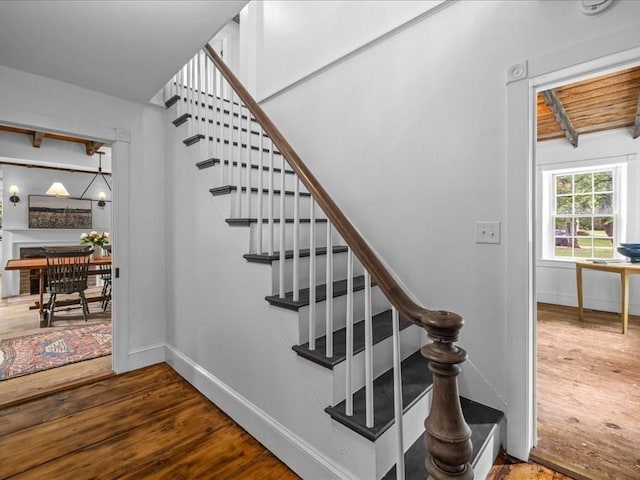 131 Cedar St, Middleboro, MA 02346 - stairway featuring wood finished floors and baseboards
